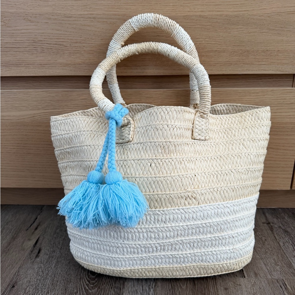 Woven Straw Beach Bag with Blue Tassel Accent